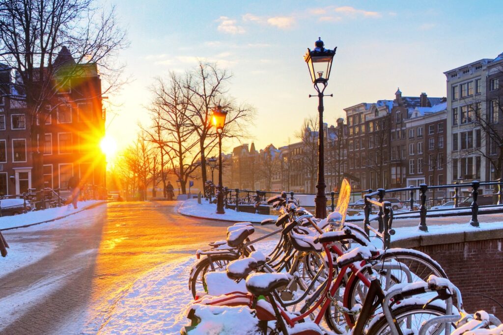 Snow-covered bicycles